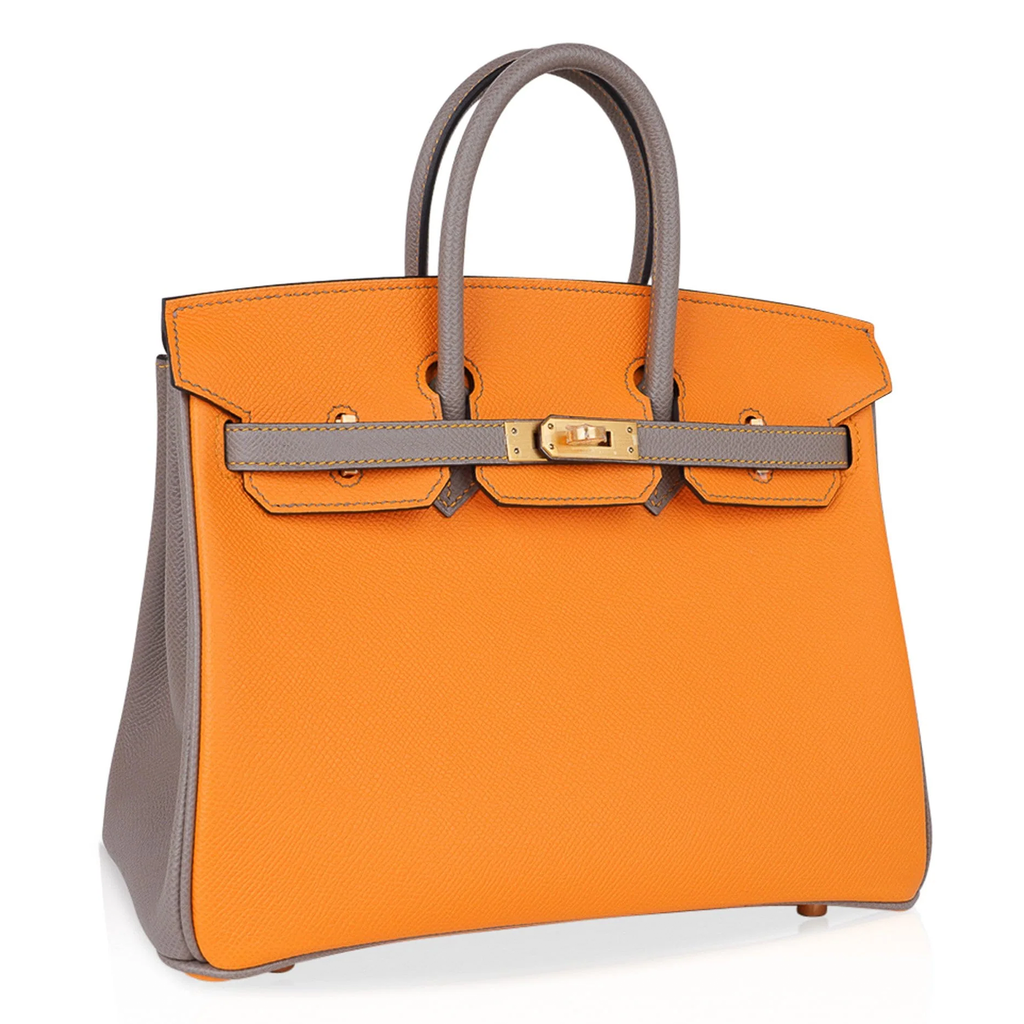 Vibrant Amber Orange Muted Ash Grey Contrast Compact Trapezoid Hand Tote With Polished Golden Twist Lock Hardware And Matching Suspended Metal Padlock Charm